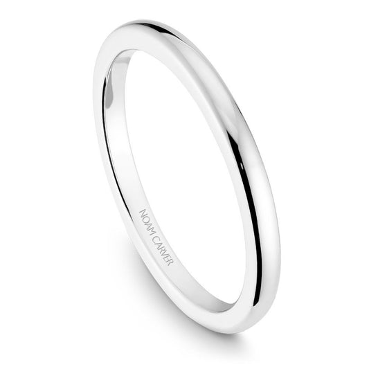 Thin Noam Carver white gold wedding band against a white background