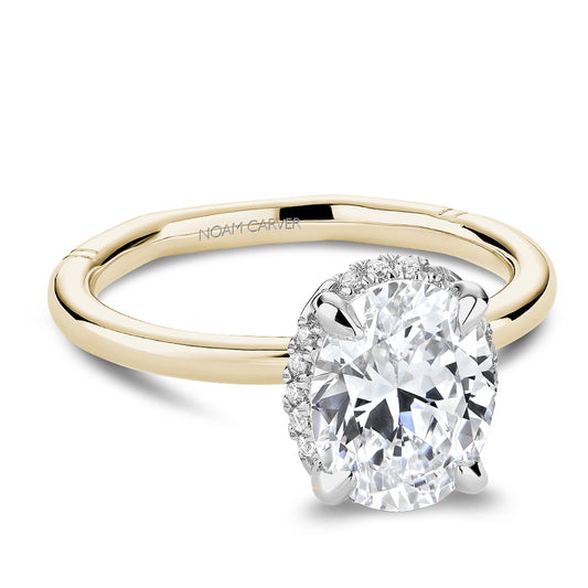 Noam Carver Yellow Gold Oval Engagement with Hidden Diamond Halo against a white background