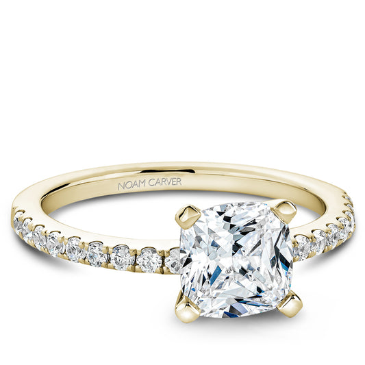Noam Carver Yellow Gold Round Engagement Ring With 18 Round Diamonds on Band against a white background