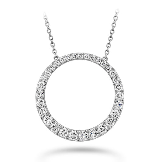 white gold diamond circle necklace against a white background