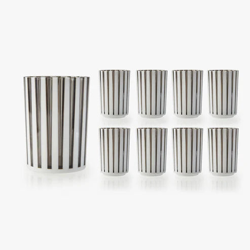 white stoneware cups with dark vertical stripes against a white background