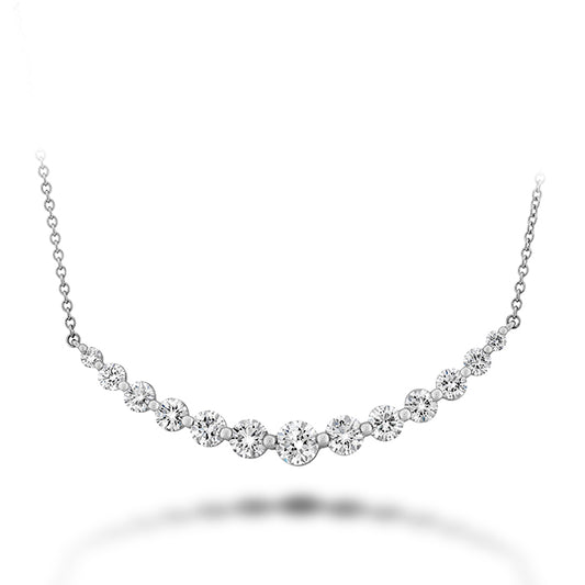 diamond "smile" necklace and chain against a white background