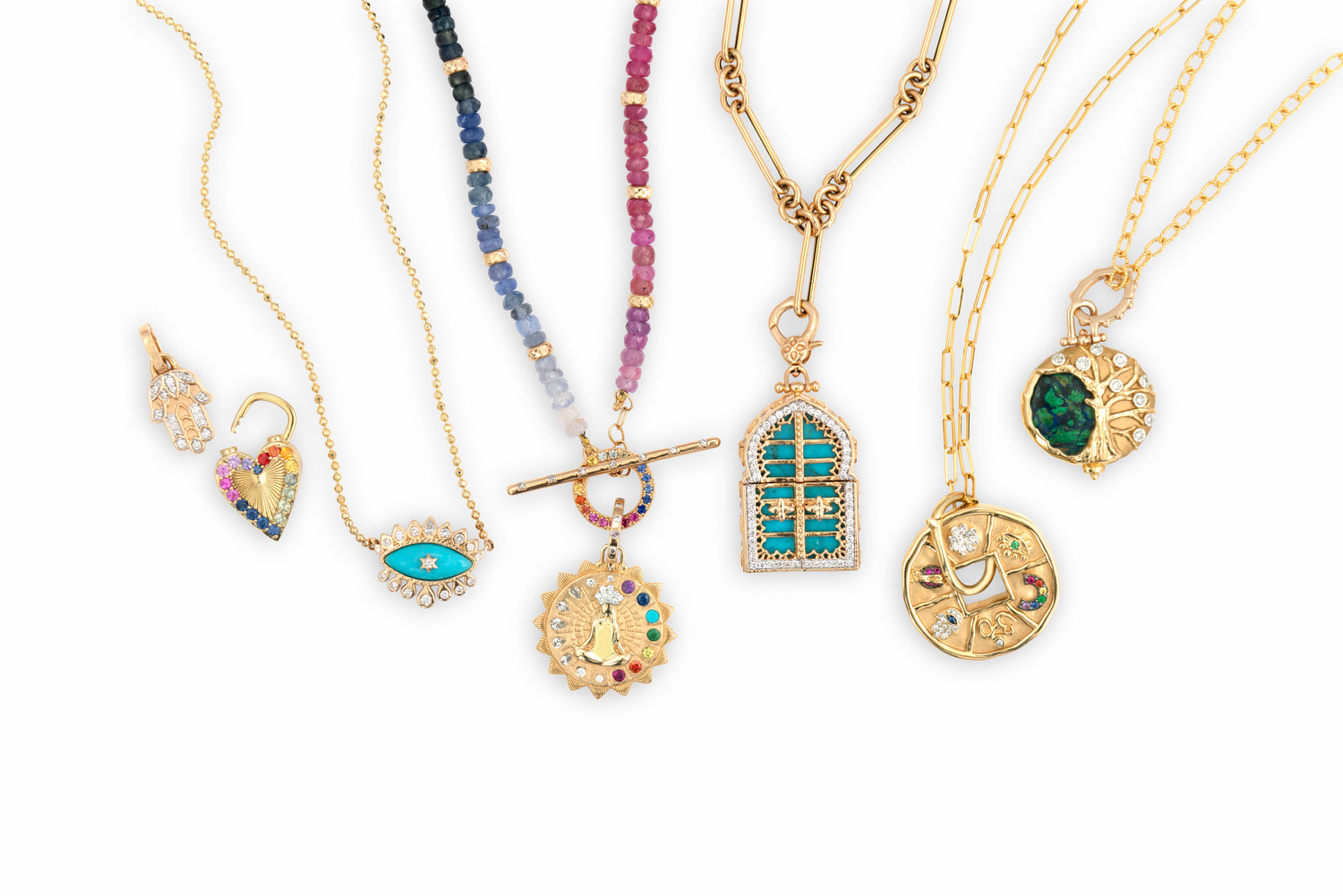 5 necklaces and 2 charms set against a white background, each a different style, including an evil eye, a tree of life, a stylized coin, and a teal and diamond doorway