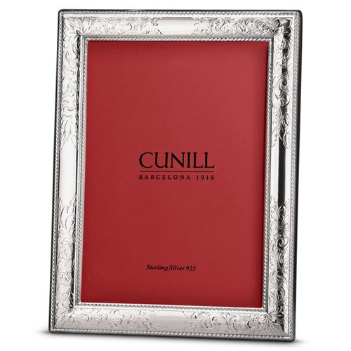 Sterling Silver rectangular picture frame with filigree designs and a red center that reads "cunill barcelona 1916 sterling silver 925" against a white background