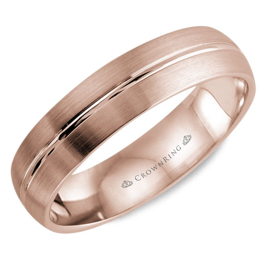 Rose gold Crown Ring wedding band against a white background