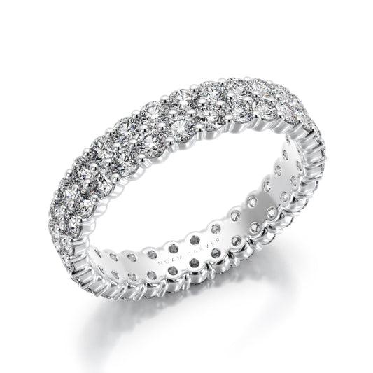 Noam Carver white gold eternity wedding band with 52 round diamonds against a white background