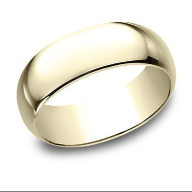 yellow gold dome wedding band against a white background