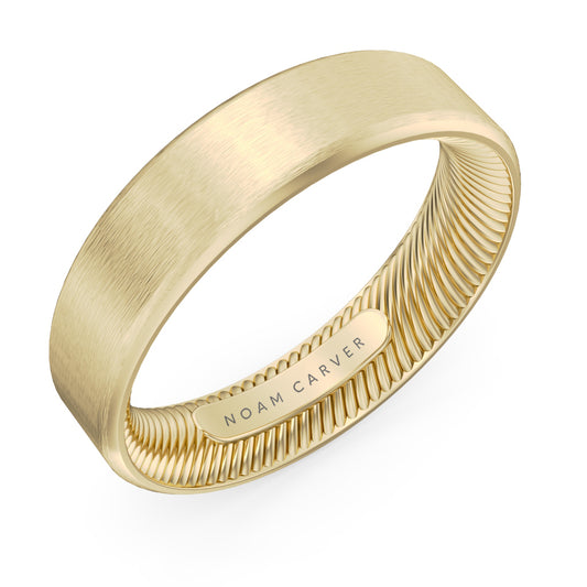 Noam Carver yellow gold wedding band in satin finish against a white background