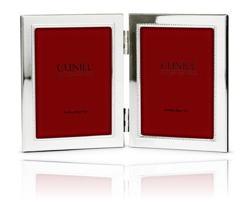 Sterling Silver Tiiffany Bead Hinged Double picture frame against a white background