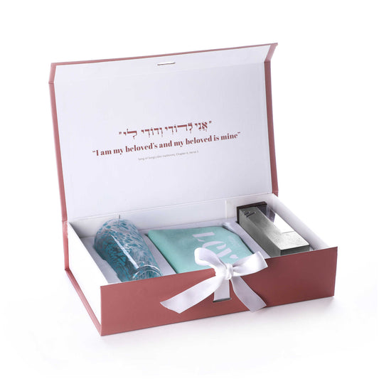 red box with white ribbon against a white background containing a blue Chuppah Breaking Glass Mezuzah. the lid reads "I am my beloved's and my beloved is mine"