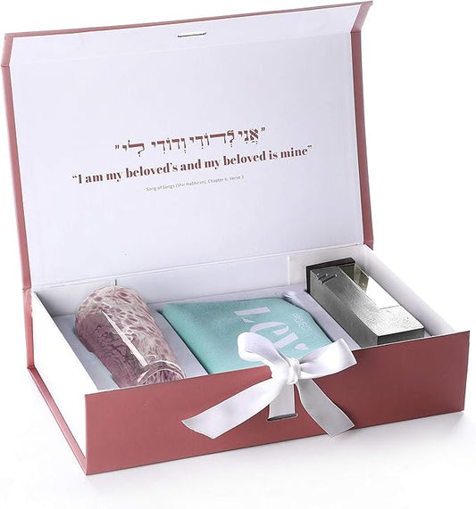 red box with white ribbon against a white background containing a pink Chuppah Breaking Glass Mezuzah. the lid reads "I am my beloved's and my beloved is mine"