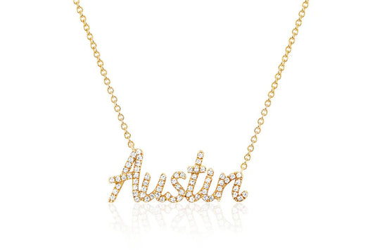 yellow gold Diamond Script Name Necklace that says "Austin" against a white background