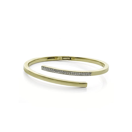 Yellow Gold & Diamond Cross-Over Bangle against a white background