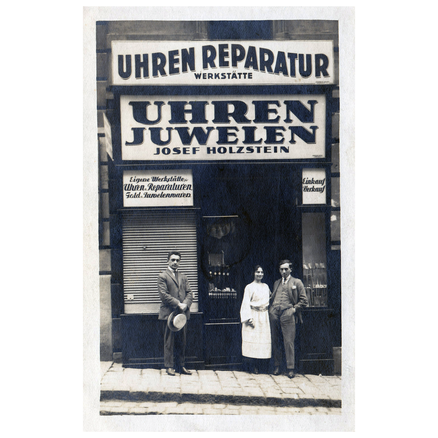 Black and white photo of Joseph Holsten in front of Holsten Jewelers in Austria