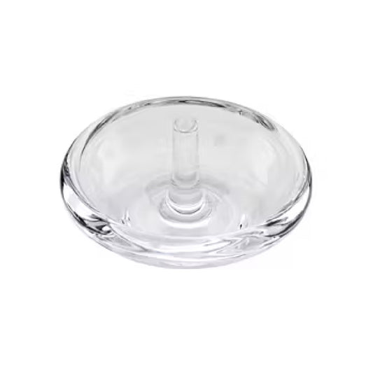 clear crystal ring holder against a white background