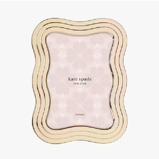 kate spade yellow gold wavy rectangle picture frame against a white background