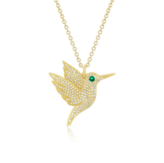 yellow gold and Diamond Hummingbird Necklace against a white background