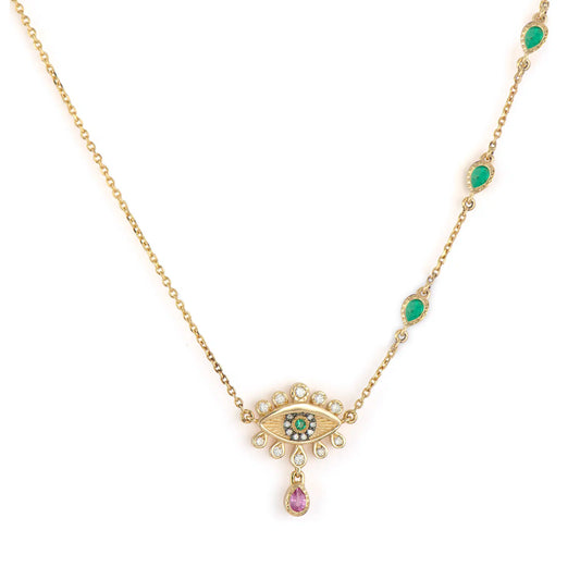yellow gold Evil Eye Emerald and Sapphire Necklace against a white background