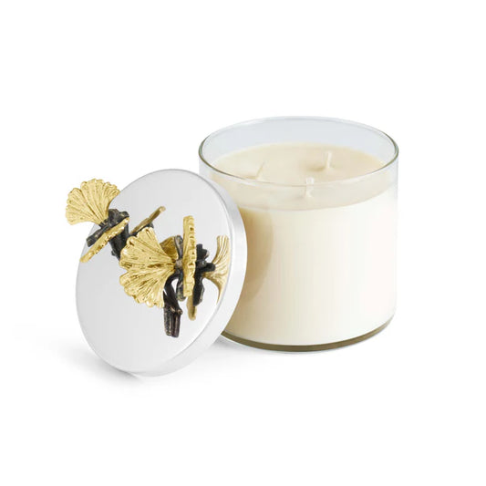 white Butterfly Ginkgo Candle with a silver lid that has yellow gold butterflies against a white background
