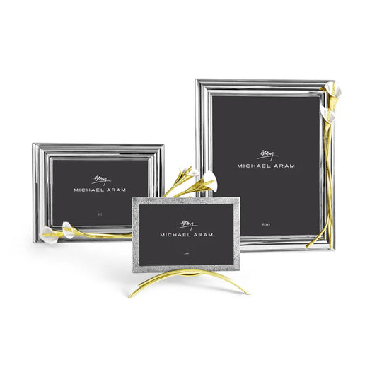 three silver Calla Lily picture Frames of varying sizes against a white background
